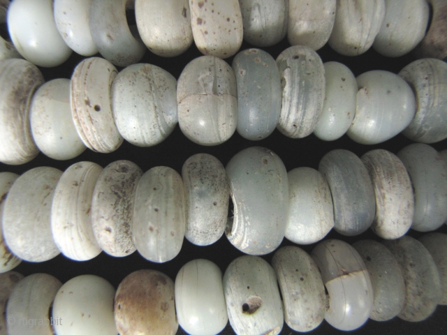 Ming Dynasty Beads: Strand of Yuan to Ming Dynasty white “milk” glass trade beads excavated from the Tak Hilltop burial site along the Thai Burmese border. These can be dated to the  ...