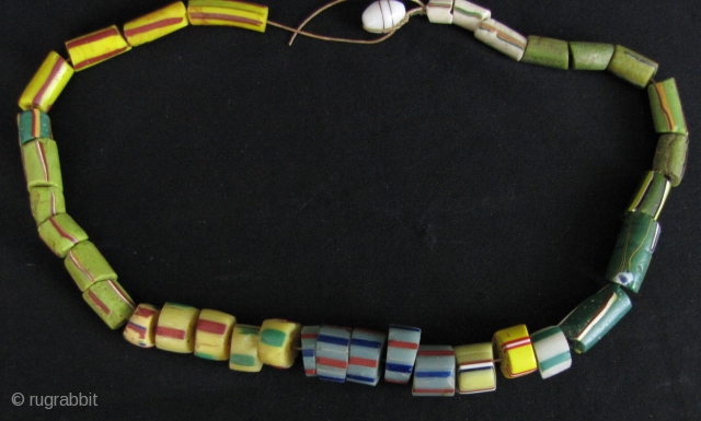 Antique African Trade Beads: Nice ensemble of old Venetian beads from Africa circa 19th century. L: 47cm/18.5in- see last enlargement for scale. Weight 98 grams. Free shipping via Hong Registered Mail
http://www.trocadero.com/stores/abhayaasianart/items/1424383/item1424383store.html
  