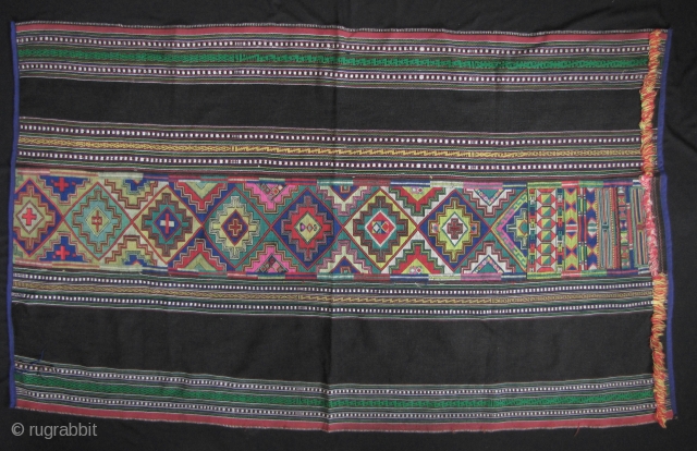 Colorful Stieng woman’s wrap around skirt from the Xtiêng (Stieng), estimated poulation of 7000, minority Binh Duong Province and Dong Nai Province of southeastern Vietnam. Hand woven with handspun cotton field and  ...