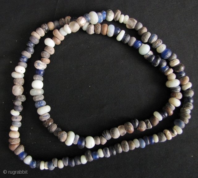 Ming Dynasty Glass Beads: Strand of Yuan/Ming Dynasty glass trade beads excavated from the Tak Hilltop burial site along the Thai Burmese border. These are datable to the 14th to 16th CE,  ...