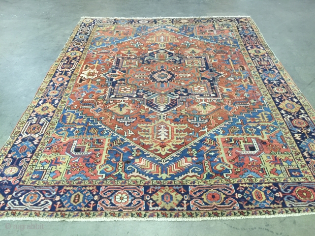 Beutiful Antique Heriz very decorative. Rug is in great condition and is ready to be used and it measures 9.6x11.7.             