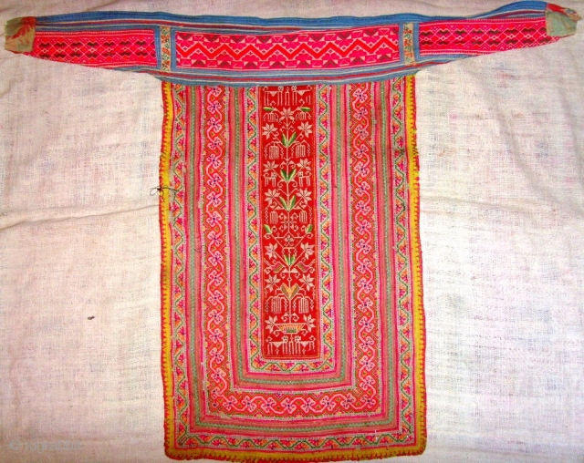 Festival apron colorful cotton cross-stitch on cotton, with added rickrack and some satin stitching. 


Hmong Miao


Minority group Yunnan Province, China.


Early 20th century.


This piece is originally made in the early 20 century and have been  ...