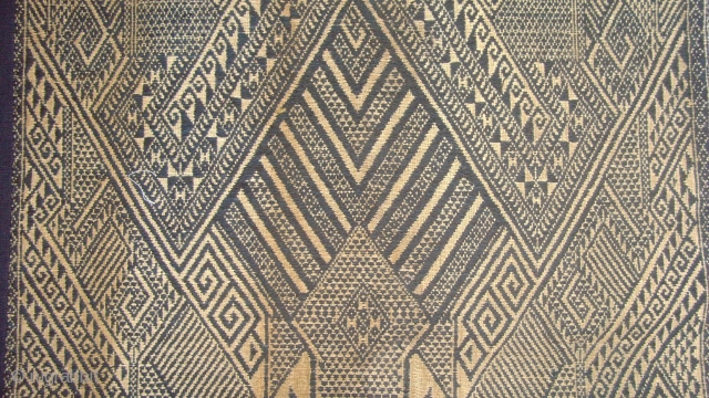 Xam Nuea ceremonial blanket.
 
This mesmerizing antique Laotian textile features multiple large ancestral figures known as Phii Nyak or Giant Spirit. This Phii Nyak combines elements of a human ancestor with that  ...