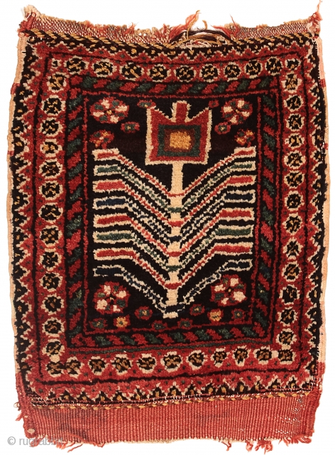 Pile bag face, Afshar tribe, Southern Persia, Circa 1900, 43 x 35 cm (17 x 14 in.) 
Knot count:	8 H x 9 V = 72 kpsi.
Colours:	brick red, dark blue, yellow, emerald green,  ...