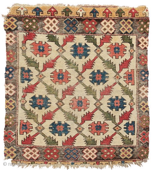 White ground rug with tribal emblems
Cappadocia 
East central Anatolia 
18th century 
111 x 90 cm (3’8” x 3’) 
L 126
symmetrically knotted wool pile on a wool foundation
The carefully drawn pattern of interlocking  ...