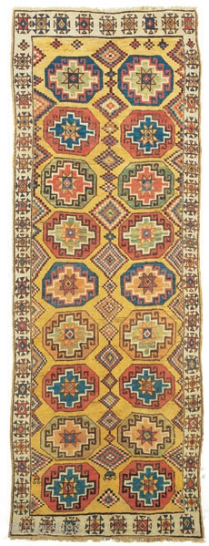 Yellow ground long rug with coffered Memling guls
Cappadocia
East central Anatolia
18th century
324 x 115 cm (10’8” x 3’9”) 
Alg 1243
symmetrically knotted wool pile on a wool foundation
Rugs of the yellow ground group have  ...