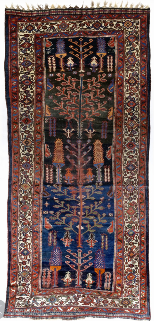 Palace size Luri long rug with Bid Majnun Weeping Willow motif. Size 430 x 125 cm. Excellent drawing, not stiff like other examples with this pattern can be, but assured and playful,  ...