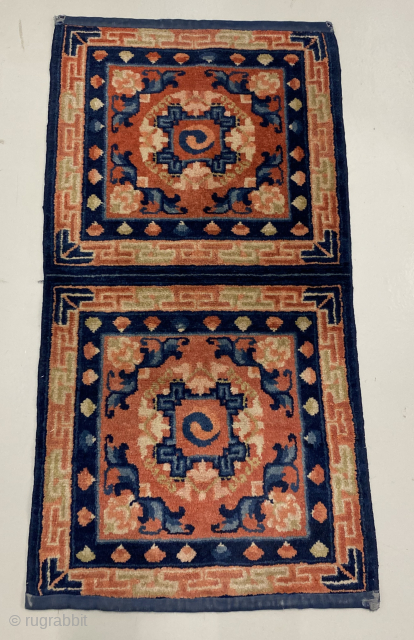 Excellent Sino-Tibetan double mat with auspicious symbols. Great colors and wool. Original cloth binding on the short sides, so as intended for use, not cut later by an unscrupulous dealer. No wear.  ...