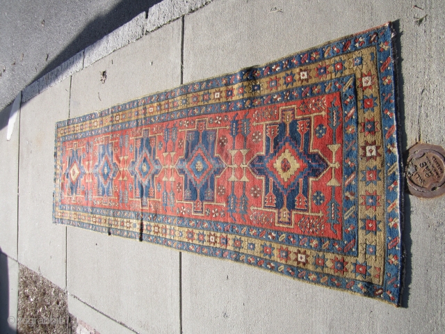 antique karaja heriz runner measuring 3' 2" x 10' 7" great colors solid rug no dry rot clean some wear few old moth bite here and there one dime size repair as  ...