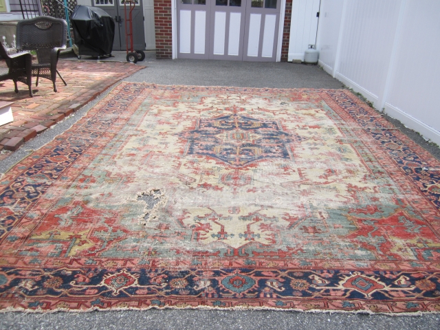 antique oversize serapi heriz rug worn condition beautiful colors has been cleaned no dry rot 2 big holes and 3 tear in one side easy restoration for huge profit measures 11' 7"  ...