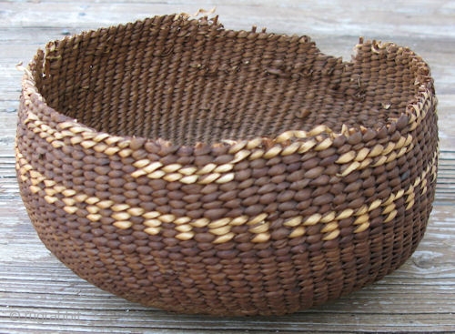 Klamath Indians cooking basket, Northern California, USA, ca.1880, hand twined spruce root decorated with bear grass in half twist overlay, stones would be heated in the fire, and then placed in the  ...