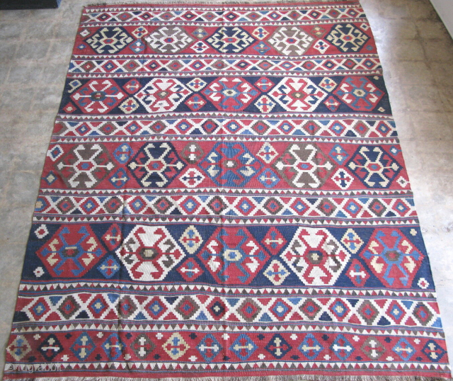 Antique Caucasian Kilim rug, hand woven wool, Caucasus Mountains, ca.1900, Shirvan or Kazak, some areas of restoration, stains, kilim rugs are flat woven tapestry weave rugs without pile, the approximate size is  ...