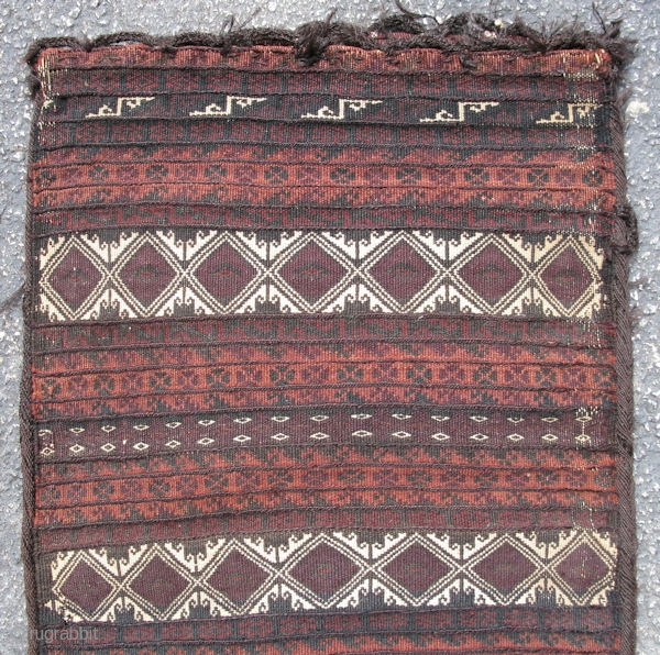 Baluch flatweave bag,wool and goat hair, 1st QTR 20thC, plain weave kilim and weft float brocade, each row is demarcated by a fine line of sumak weave done with goat hair, decorative  ...