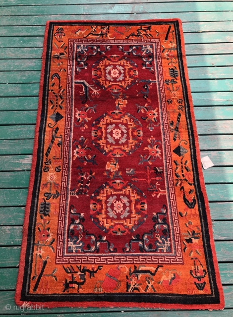 Tibetan rug, size 162*86cm. Hand made antique Tibetan rug, beautiful bright color ,flowers pattern. It with good age and condition no any repair.wool warp cotton weft.       