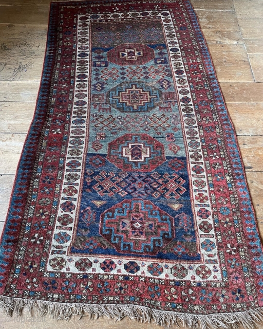 Caucasian rug with unusual but very attractive colour palette. Robust enough for the floor. No major issues. Had a good clean and maybe needs another. 215 by 103 or 110cm depending which  ...