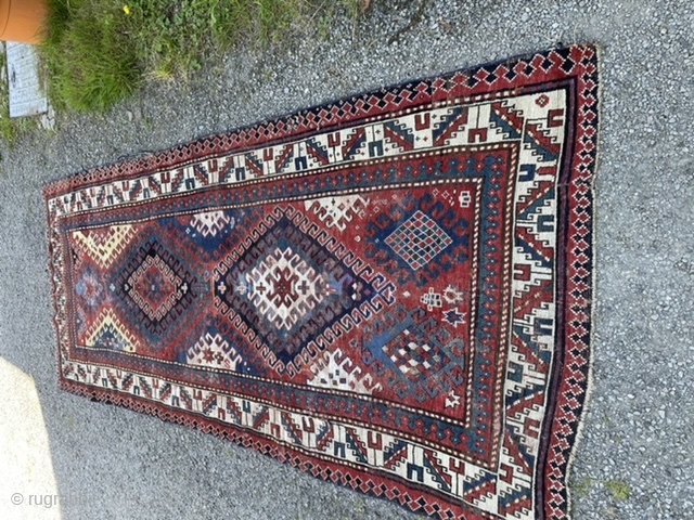 19th century Kazak, possibly bordjalou. Some wear, repile and sides secured. Priced accordingly. Decorative and good for the floor. 280 by 120cm.           