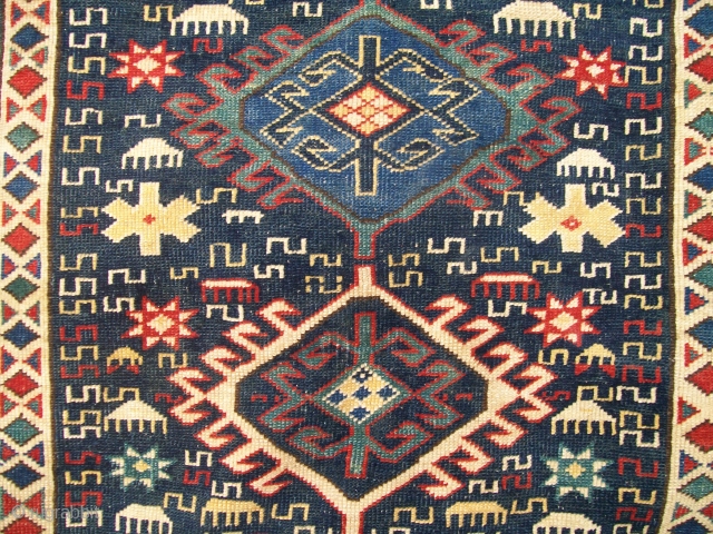 Beautiful circa 1900 Shirvan rug [5'6"x4'2" or 167x127 cm]. Excellent condition with original sides, perfect handle, all wool with natural colors, strong design with many S's and combs, unusually sharp crabs border.  ...