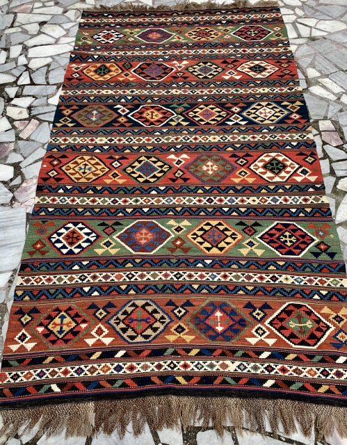  beautiful antique caucasian kelim from the late 19 c. Excellent condition original knotted end finishes with all natural dyes including some camel  hair see detail.  Great piece available. Size  ...