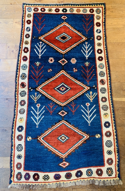 Fine antique qashqai gabbeh rug ca 1900 size 209 x 109 cm. great wool and outstanding natural dyes 
Very good condition few tiny repairs missing outer blue guard at bottom original selvedges  ...