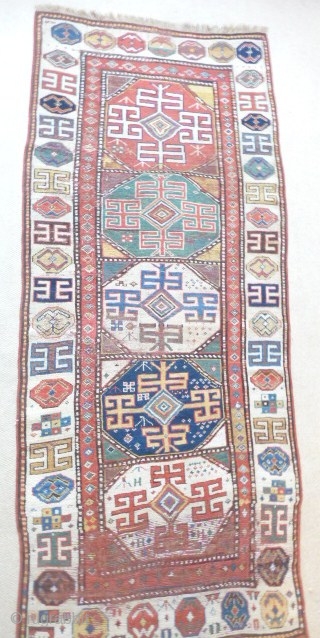 Gorgeous early Kazak long rug,first half 19thcent. lovely colours, old repairs,rebound sidecords,  8ft3in x 3ft4in SOLD                