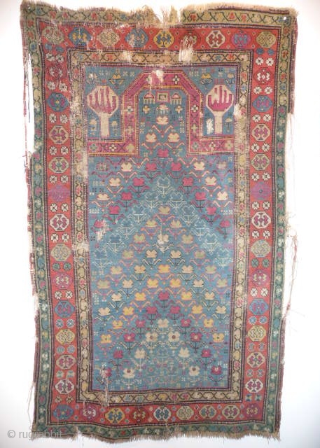  SOLD Very pretty 19th cent. caucasian prayer rug, old repairs, splits,needs washing and mounting.                  