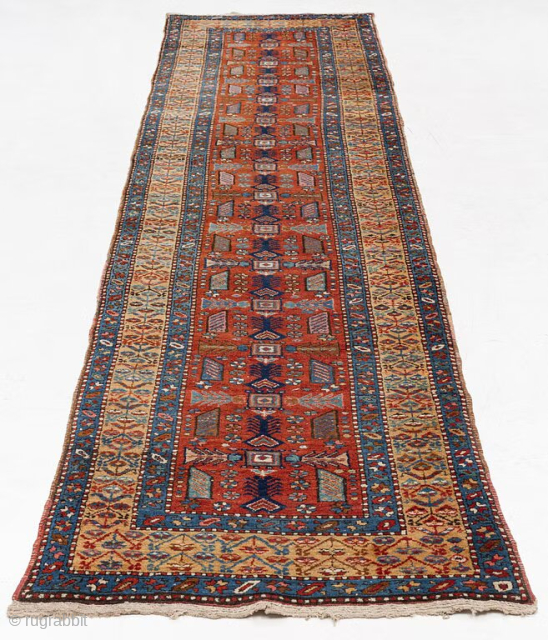 Heriz runner, 12'10" x 3'2" in size. Good condition, beautiful colours.                      