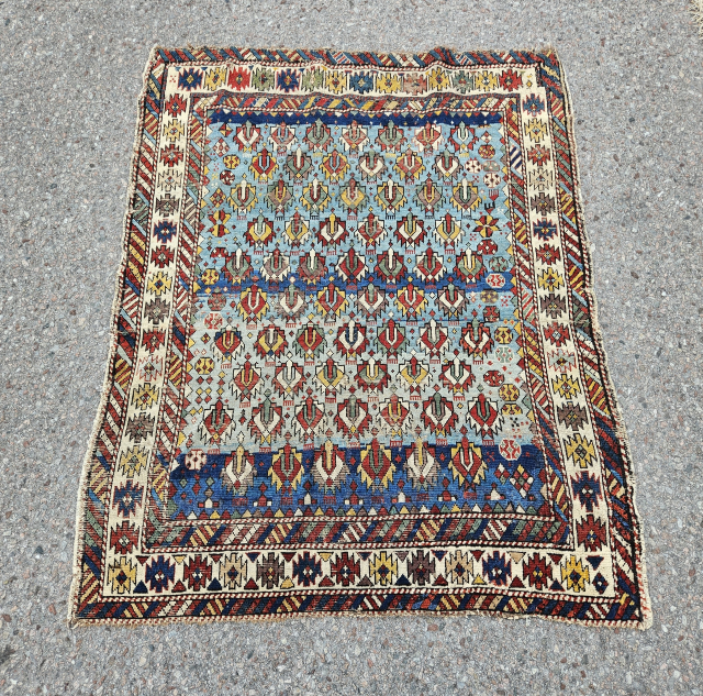 Delicate Kuba rug size 4'2" x 3'4".                          