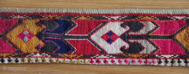 Peshkurta needlepoint border, Uzbekistan, circa 1900.
L: 112 cm.  W: 7 cm.
Silk needlepoint on homespun cotton, iroki stich, two joined parts, floral ornamentation.
          