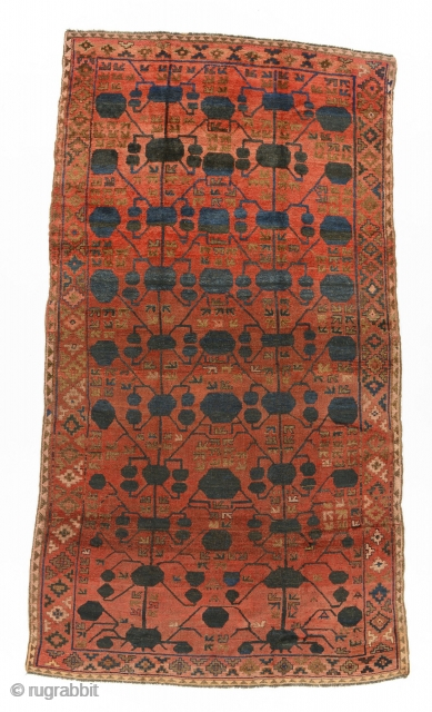 Kyrgyz Sarai Gilliam, Ferghana, Central Asia, late 19th century or early, 360 by 206 cm, an exceptionally rare for Kyrgyz carpets pomegranate design (Kashgar nuska gul) borrowed from Chinese Turkestan's silk carpets,  ...