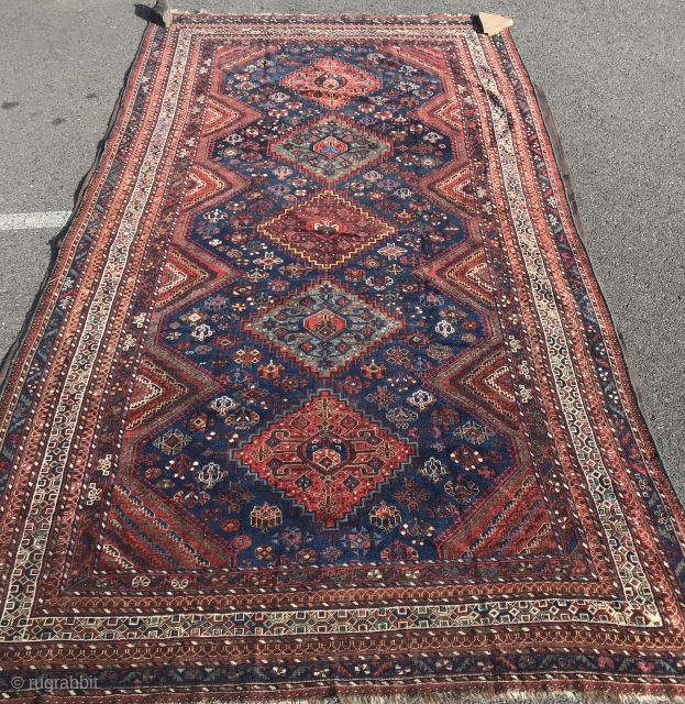 Khamseh main carpet. Size 7’3”x 13’4 very good condition, even wear, one small repair on corner. Supple handle.               