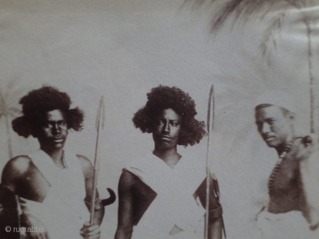 These guys are waiting for an invitation to your country. Albumen print cm12x17. Three Sudanese soldiers. Second half of nineteenth century            