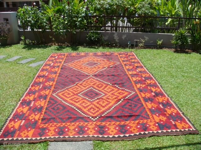 Hazara Kilim from Sar-i-Pul, Afghanistan. Mid-1960's. Wool on Wool. 
Approx. size: Length: 15ft (457.2cm). Width: 9ft 5 in. (287cm).
Hazara Kilims are often wrongly categorized as Almar or Maimana Kilims
(perhaps due to design  ...