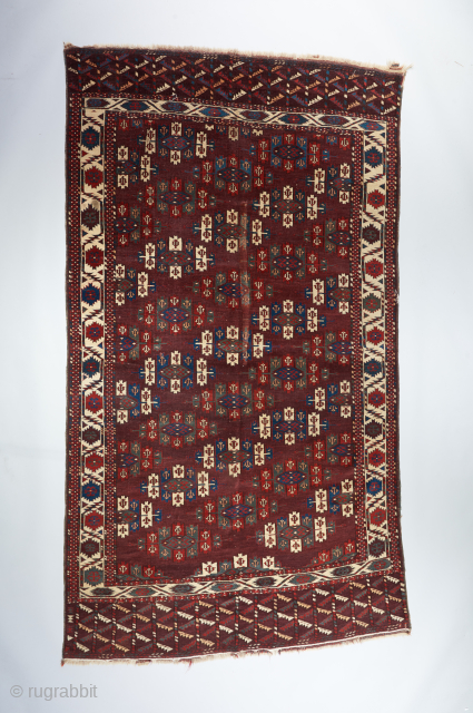 A really beautiful Yomut main carpet with a crisp clear color palette and a fine weave. Has one repair in the middle as visible. Otherwise all original with good pile. Mid 19th  ...