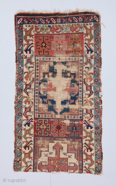 A Chan Karabagh fragment. Probably first half of the 19th century. Interesting cross design usually seen in Shahsavan bags. Beautifully articulated border of the type, with a two-bird head variant. Great color  ...