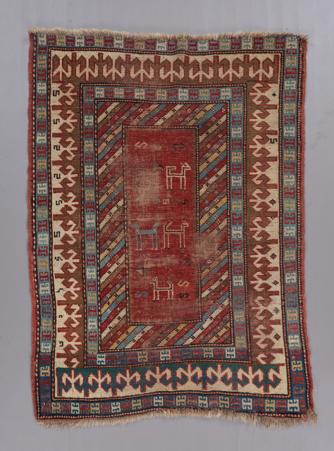 A lovely little whimsical Caucasian rug. 4'x 3'.                         