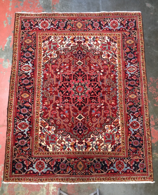 Small superb quality Heriz rug circa 1930. Size: 5'0" x 6'2". Clear jewel colors, soft glossy wool, fine weave, and a supple handle. Perfect condition with thick full pile over the entire  ...