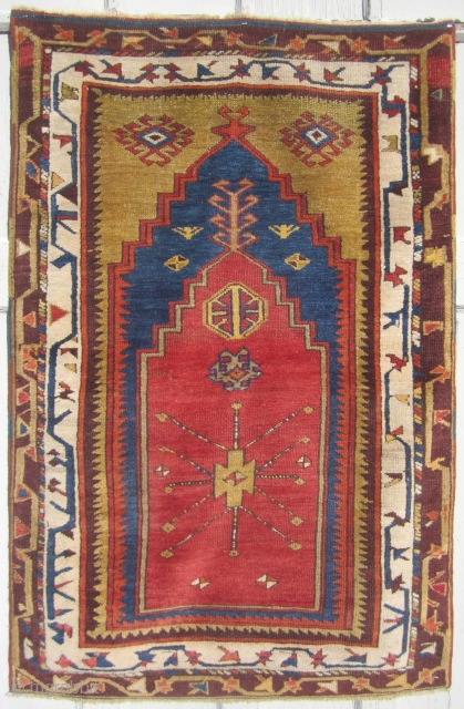 An Anatolian carpet from the Konya region. Woven in the last quarter of the 19th century. Exquisite colors, full pile and an overall masterpiece to gaze upon. It measures to 4ft 2in  ...