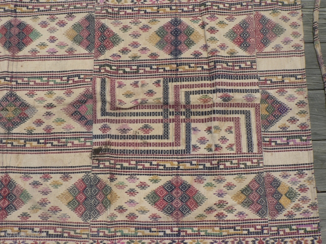 Old Textile from Bhutan, known as kushu bundri, used as a cloth for wrapping and carrying things, functioning like a backpack bundle. 46 x 46 inches. In the book, "From the Land  ...