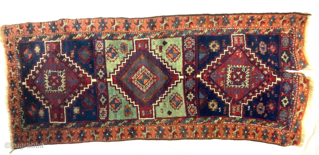 East Anatolian Kurd Yuruk Rug, Turkey, late 19th century. 2'7'' x 6'6'' (79 x 198 cm). Wool pile, wool warp, wool weft. Good pile and beautiful colors. Obvious split damage at one  ...