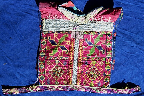 Swat Embroidered Textile, yoke from a child's top. This is an excellently rendered child’s yoke from Swat region, executed in tiny cross-stitch embroidery. The front is 10.5 inches wide and 11 inches  ...