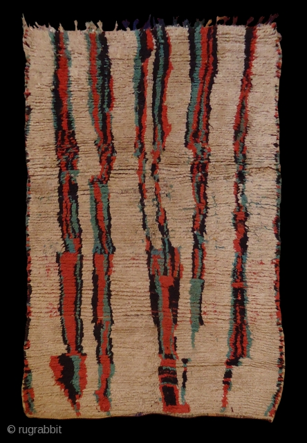 h-1065-Azilal pile rug, Morocco. Circa 1970, size: 230x140 cm
Even middle pile, hand spun wool ( white ground ) and fibrane fiber ( colored yarns ), three stains on the back, ( in  ...