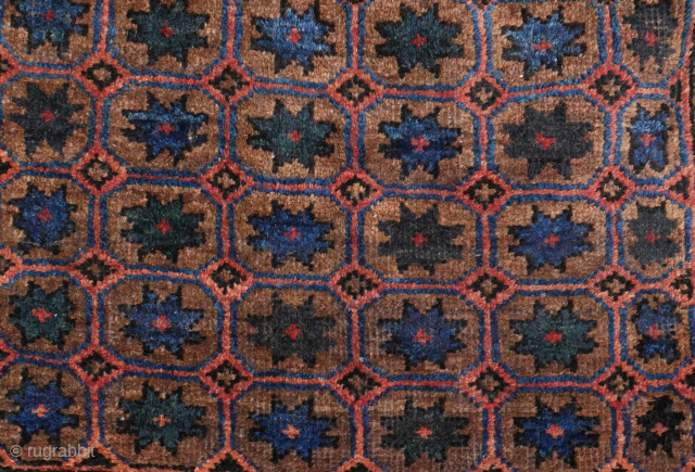 Happy New Year
Rare and beautiful Baluch bag with tile pattern and stars, prob with camel hair, natural colours, apart maybe from the small silk orange knots, very good condition, complete closing system,  ...