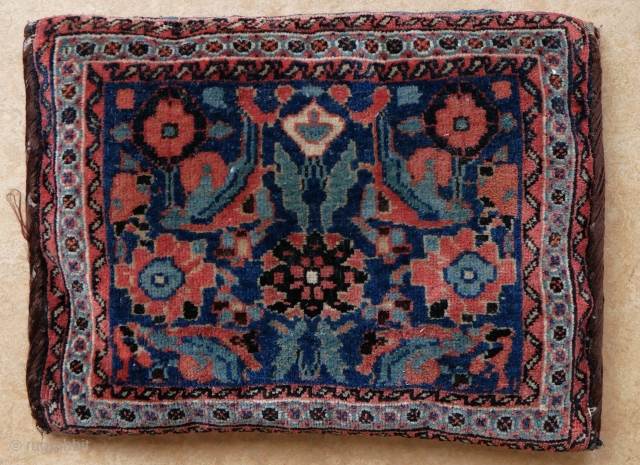 small attractive pillow with flowers. It is a bagface with a Persian origin and a not matching kilim backside. Well made, good condition. 42 x 33 cm.      