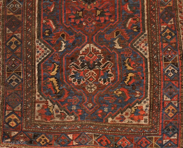 Khamseh rug with phantastic natural colours, in used condition, but very charming,
with fishes and a few birds, 90 x 138 cm.            