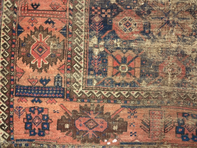 Ancient minakhani Baluch rug. (price not commensurate with condition)                        