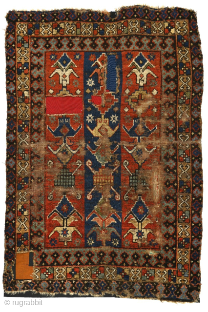 An unusual East Anatolian rug with columns of palmettes integrated into a large-scale striped textile design, great wool and color , 3'6"x5'6"           