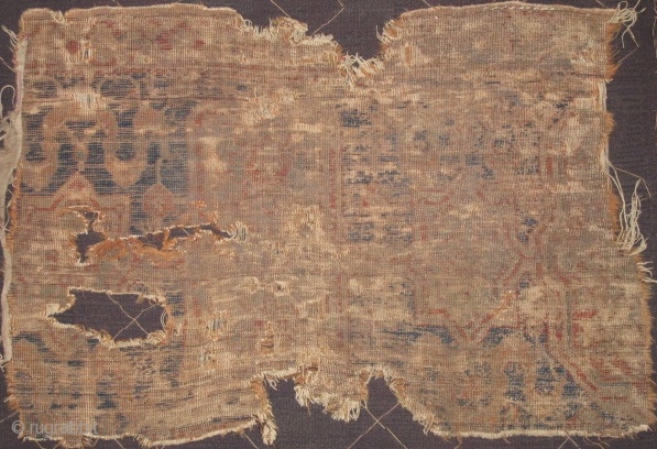 Ghostly border fragment with cloudbands and cartouches from a circa 1500 NW Persian carpet,either Aq Quyunlu (pre-Safavid) or Shah Ismail period. This is most likely from an early Tabriz area medallion carpet  ...