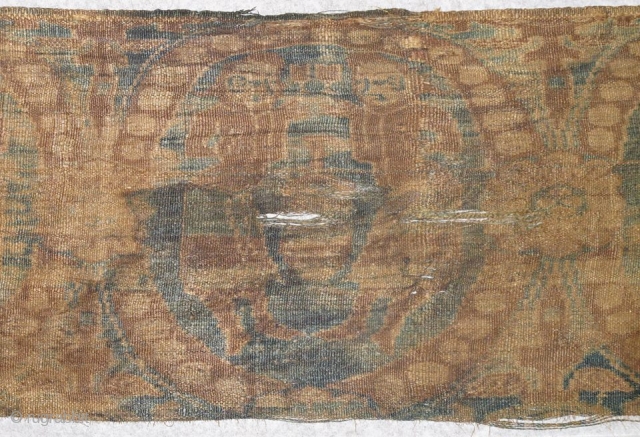 6th century Chinese warp-faced silk textile with roundels featuring wine and Central Asians                    