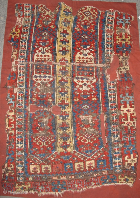 East Anatolian Kurdish rug fragment. Super vibrant madder. mounted and conserved.                      