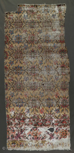 Minakhani fragment, late 18th century / circa 1800. Khorasan jufti knotted type a rare yellow ground. Worn but majestic. Size is 33'x75'           